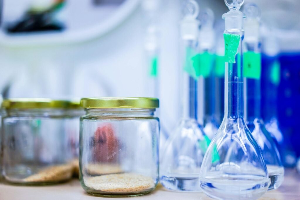 A close-up view of laboratory glassware and jars, used for scientific experiments.